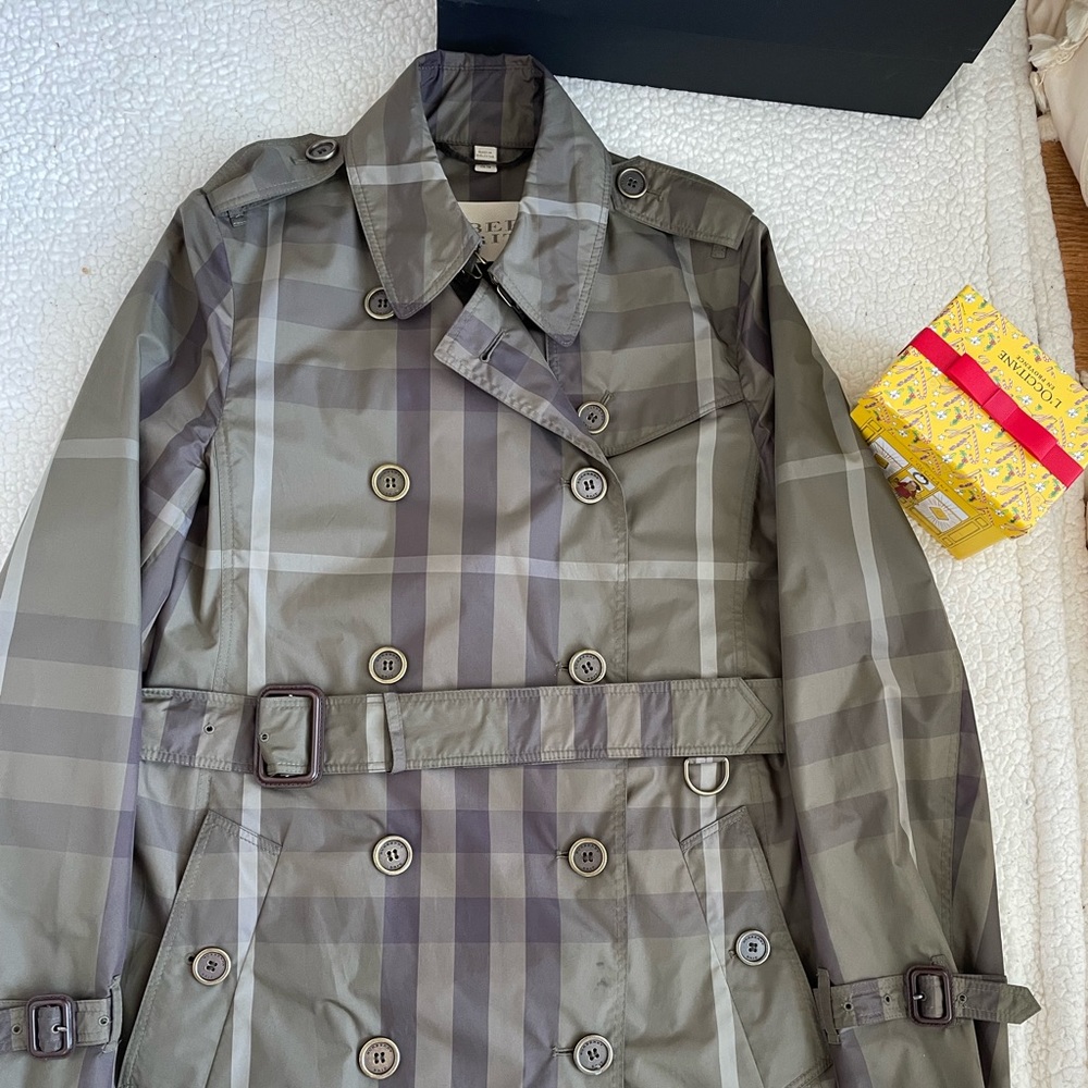Raincoat in green checkers.